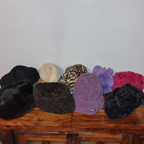 211 - Large quantity of ladies hats including Kangol.