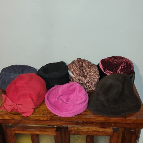 211 - Large quantity of ladies hats including Kangol.