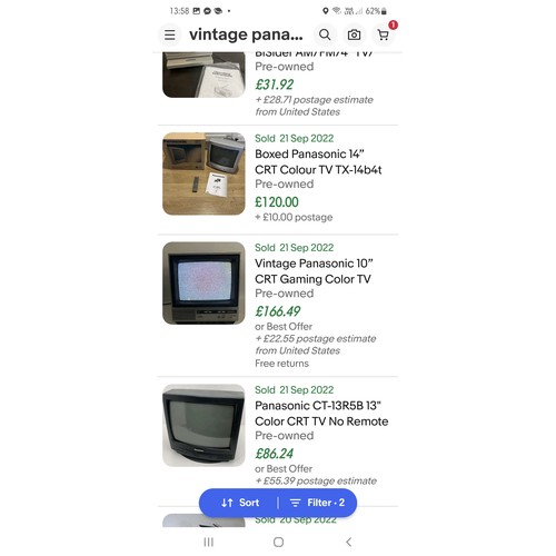 214 - Vintage Panasonic TC-1485 portable tv with original remote control.