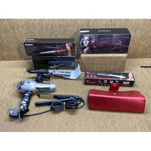 258 - Collection of Beauty electricals including Boxed Babyliss curling wand and hair straighteners.