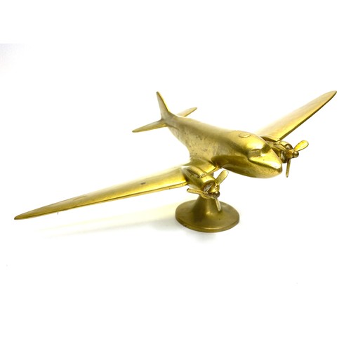 1147 - Solid brass ornamental DC3 Dakota (possibly). 28 cm length .