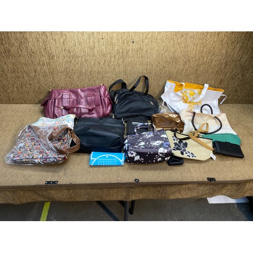 295 - Large quantity of ladies bags and purses mostly retail packaged.