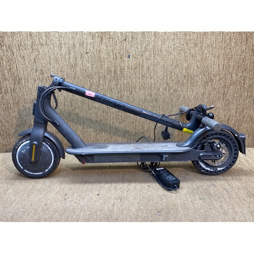 754 - Mi.com electric scooter with charger in working order.