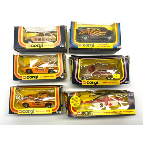 761 - Six boxed vintage Corgi vehicles including VW Polo 302, Skycrane casualty helicopter, Porsche 924, V... 