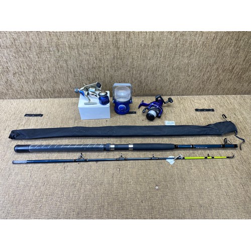 312 - Fishing items including two Okuma fishing reels and a Ron Thompson EVP2 boat casting rod.