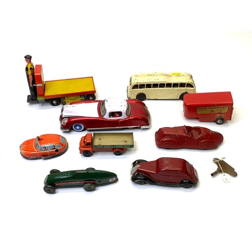 779 - Collection of tin plate clockwork cars including Tri-Ang and Met Toy.