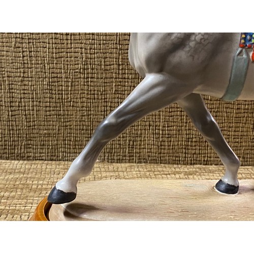 1156 - Grey Beswick show horse in a matte finish on wooden plinth 26cm tall.