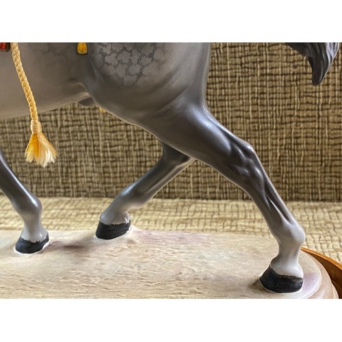 1156 - Grey Beswick show horse in a matte finish on wooden plinth 26cm tall.