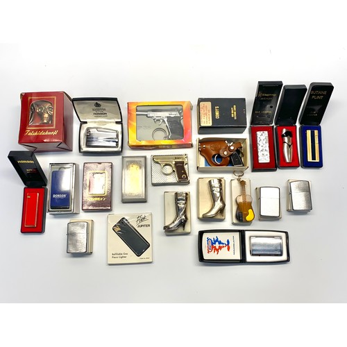 653 - 20 boxed vintage novelty lighters including Ronsons and kingsway.