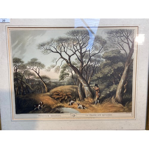 20 - Two framed G.Godby hunting scene lithographs including woodcock and grouse shooting. 60 x 48 cm.