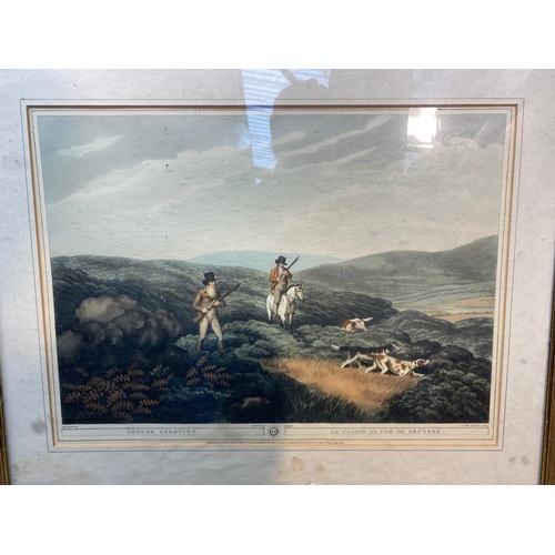 20 - Two framed G.Godby hunting scene lithographs including woodcock and grouse shooting. 60 x 48 cm.