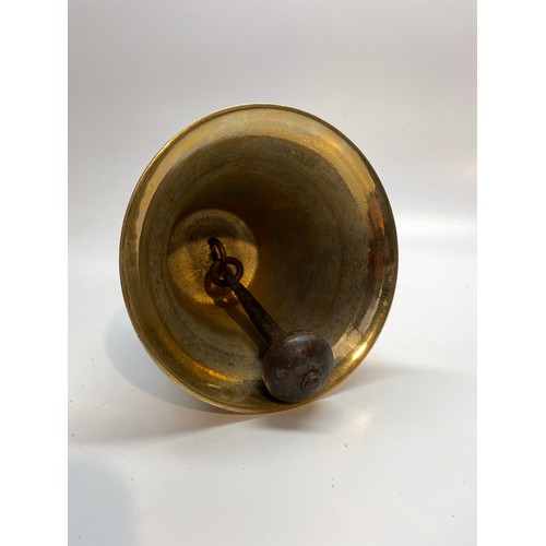 665 - Antique bronze and brass bell with a maple wood handle.