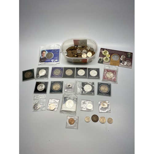 669 - Collection of coins including 11 cased commemorative crown coins.