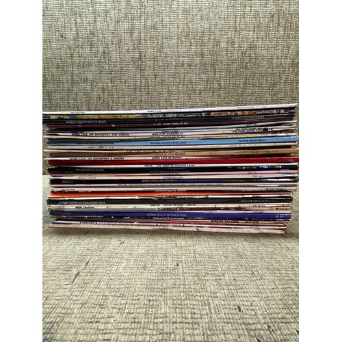 111 - A quantity of vinyl records including Abba, Boney M and The Rubettes