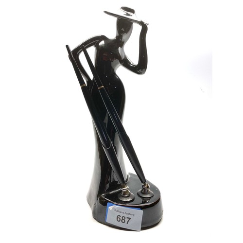 687 - Art Deco ceramic pen holder statue. 30cm tall.