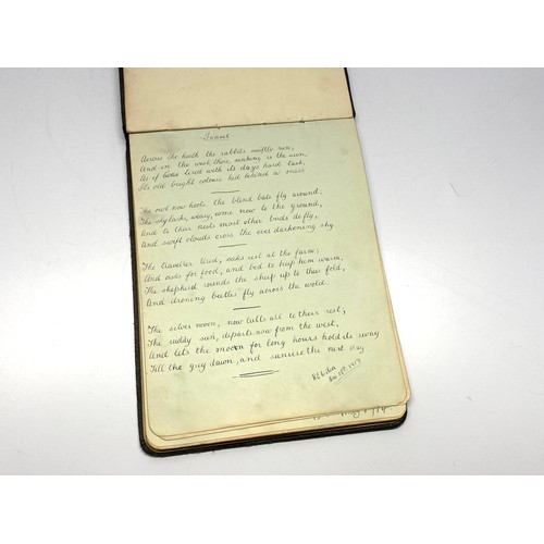 1165 - Autograph book that has been used as a sketch book with drawings and poems from 1913.