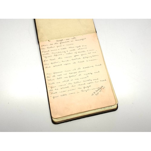 1165 - Autograph book that has been used as a sketch book with drawings and poems from 1913.