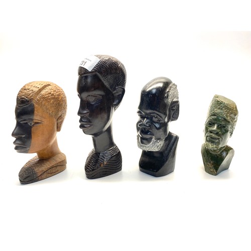 731 - Ebonised and marble African figures. Tallest 17 cm.