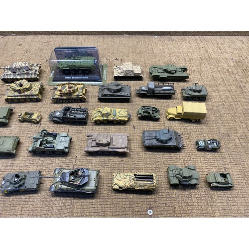 1220 - Large quality of worldwide military tanks in plastic and diecast made complete in kit form.