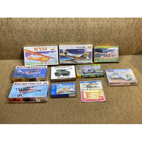 1231 - Selection of model military aircraft and tanks kits including Lindburg , Revell and Monogram.