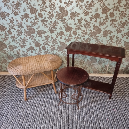 89 - Wicker side table, rustic cast iron and mahogany side table and a wooden hallway table.