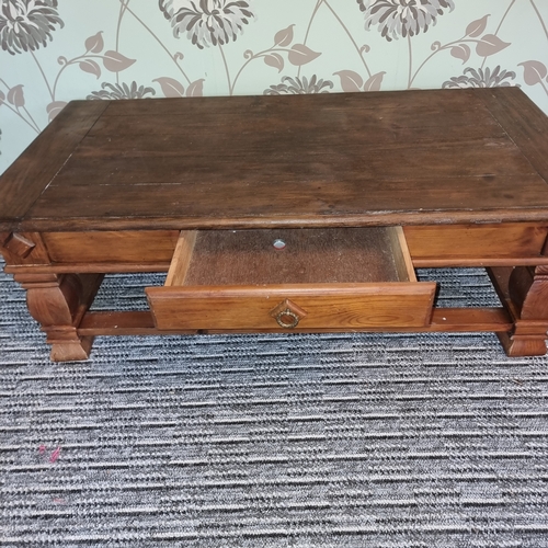 91 - Solid oak coffee table 130cm x 85cm.