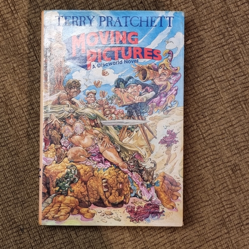 1067A - Two Terry pratchett first edition books Faust Eric and Moving Pictures.