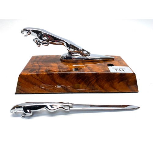 744 - Jaguar table top pen holder and letter opener on wooden plinth.