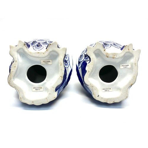 751 - Two Blue and White ceramic owls 24cm tall.