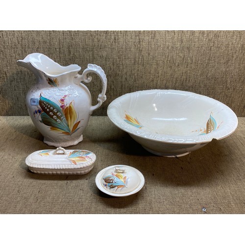 764 - Ceramic hand painted bathroom set Circa 1900 including wash bowl , jug and soap dishes. Slight damag... 