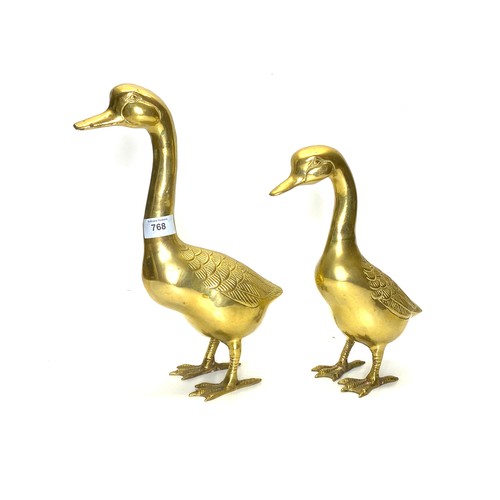 768 - Pair of brass ducks . Tallest 35 cm.