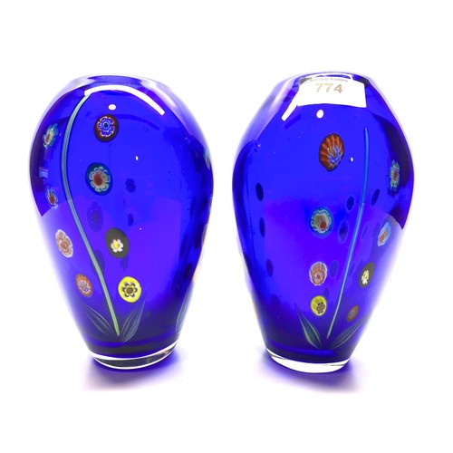 774 - Pair of heavy blue vases in a millefiori style. 21cm.