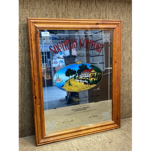 776 - Southern Comfort mirrored advertising picture in pine frame. 65x52 cm.