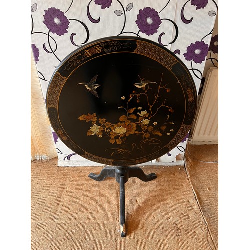 68 - Chinese ebonised folding table. Diameter - 78 cm and Hight - 77 cm.