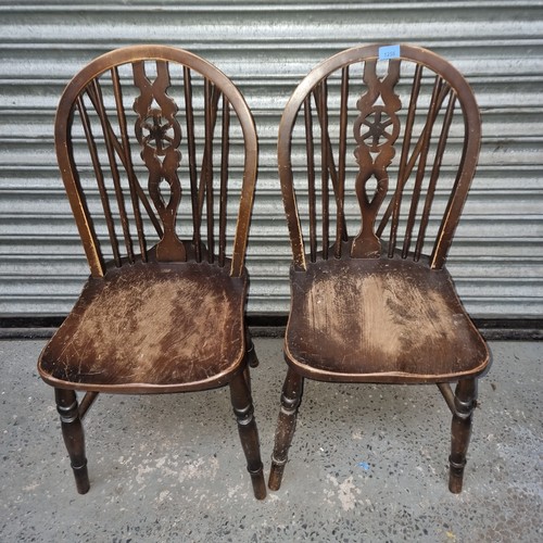 86 - Two cottage chairs.