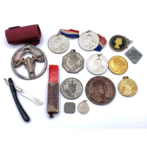 658 - Selection of commemorative medals and coins.