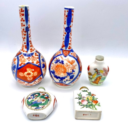 671 - Three Chinese scent bottles and two Chinese stem vases small chip to base in one.