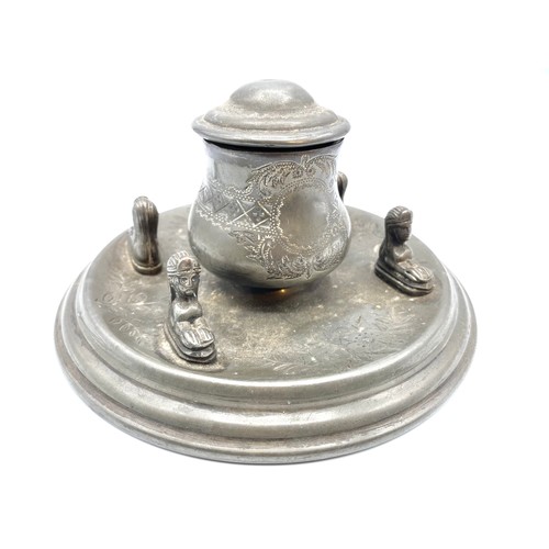 673 - Pewter inkwell with Sphinx figures surrounding.