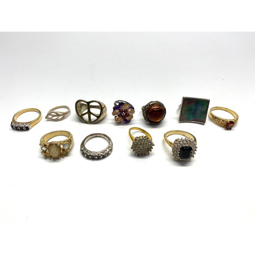 706 - Selection of costume and silver rings.