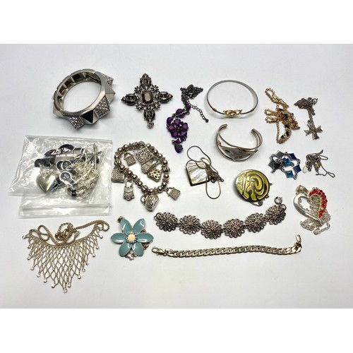 707 - Collection of white metal costume necklaces and bracelets including some silver.