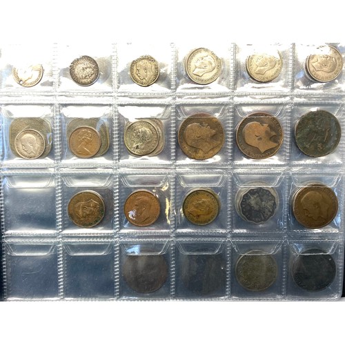 853 - Two books of British and world coins including some silver content.