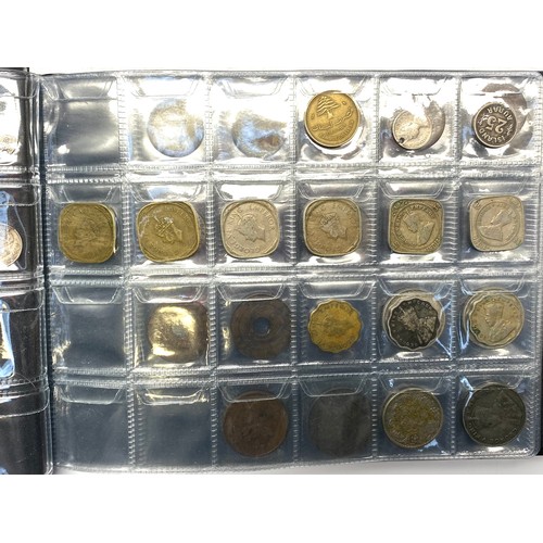 853 - Two books of British and world coins including some silver content.