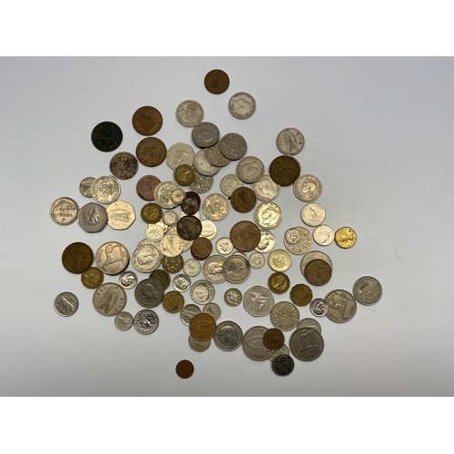 856 - Large collection of British and Irish and American coins possibly some silver.