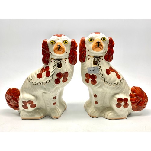 710 - Pair of large fireside dogs 35cm tall.