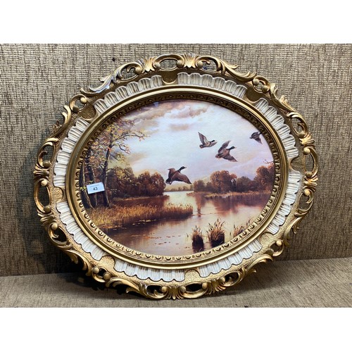 43 - Oval flying geese scene 70cm.