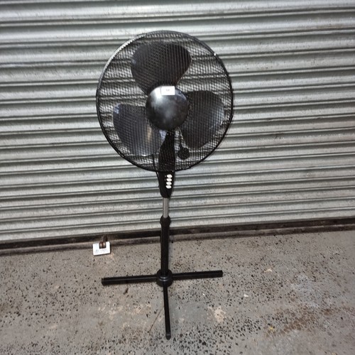 58 - Tall standing electric fan .