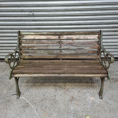 59 - Wooden and cast iron bench. (wood requires work)