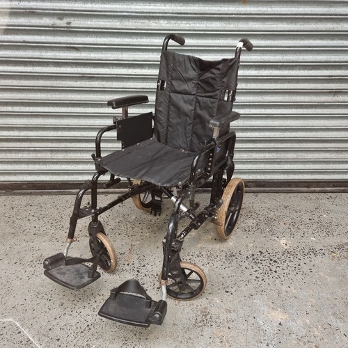 97 - Foldable wheel chair.