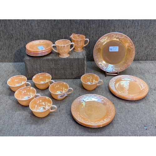 195 - USA decorative fire king ware tea set.