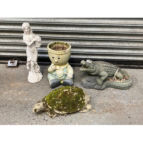 150 - Concrete garden ornaments including a tortoise and crocodile.